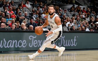 SAN ANTONIO, TX - OCTOBER 13: Marco Belinelli #18 of the San Antonio Spurs handles the ball against the New Orleans Pelicans during a pre-season game on October 13, 2019 at the AT&T Center in San Antonio, Texas. NOTE TO USER: User expressly acknowledges and agrees that, by downloading and or using this photograph, user is consenting to the terms and conditions of the Getty Images License Agreement. Mandatory Copyright Notice: Copyright 2019 NBAE (Photos by Logan Riely/NBAE via Getty Images)