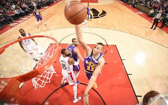 1076519972 TORONTO, CANADA - JANUARY 1: Dante Exum #11 of the Utah Jazz dunks the ball against the Toronto Raptors on January 1, 2019 at the Scotiabank Arena in Toronto, Ontario, Canada. NOTE TO USER: User expressly acknowledges and agrees that, by downloading and or using this Photograph, user is consenting to the terms and conditions of the Getty Images License Agreement. Mandatory Copyright Notice: Copyright 2019 NBAE (Photo by Ron Turenne/NBAE via Getty Images)