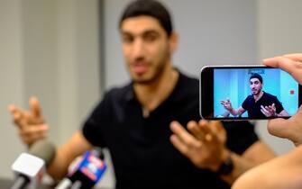 686752056 NEW YORK, NY - MAY 22: Turkish NBA Player Enes Kanter speaks to media during a news conference about his detention at a Romanian airport on May 22, 2017 in New York City. Kanter returned to the U.S. after being detained for several hours at a Romanian airport following statements he made criticizing Turkey's president Recep Tayyip Erdogan. (Photo by Eduardo Munoz Alvarez/Getty Images)