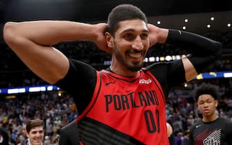 DENVER, COLORADO - MAY 12: Enes Kanter #00 of the Portland Trail Blazers celebrates their win against the Denver Nuggetts during Game Seven of the Western Conference Semi-Finals of the 2019 NBA Playoffs at the Pepsi Center on May 12, 2019 in Denver, Colorado. NOTE TO USER: User expressly acknowledges and agrees that, by downloading and or using this photograph, User is consenting to the terms and conditions of the Getty Images License Agreement. (Photo by Matthew Stockman/Getty Images)