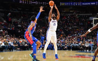 PHILADELPHIA, PA - OCTOBER 15: Joel Embiid #21 of the Philadelphia 76ers shoots a three-pointer against the Detroit Pistons during a pre-season game on October 15, 2019 at the Wells Fargo Center in Philadelphia, Pennsylvania NOTE TO USER: User expressly acknowledges and agrees that, by downloading and/or using this Photograph, user is consenting to the terms and conditions of the Getty Images License Agreement. Mandatory Copyright Notice: Copyright 2019 NBAE (Photo by Jesse D. Garrabrant/NBAE via Getty Images)