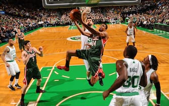 BOSTON, MA - DECEMBER 3: Giannis Antetokounmpo #34 of the Milwaukee Bucks goes to the basket against the Boston Celtics on December 3, 2013 at the TD Garden in Boston, Massachusetts.  NOTE TO USER: User expressly acknowledges and agrees that, by downloading and or using this photograph, User is consenting to the terms and conditions of the Getty Images License Agreement. Mandatory Copyright Notice: Copyright 2013 NBAE  (Photo by Brian Babineau/NBAE via Getty Images)