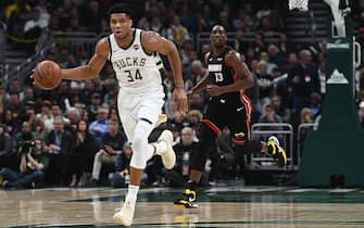 MILWAUKEE, WISCONSIN - JANUARY 15:  Giannis Antetokounmpo #34 of the Milwaukee Bucks handles the ball during a game against the Miami Heat at Fiserv Forum on January 15, 2019 in Milwaukee, Wisconsin. NOTE TO USER: User expressly acknowledges and agrees that, by downloading and or using this photograph, User is consenting to the terms and conditions of the Getty Images License Agreement. (Photo by Stacy Revere/Getty Images)