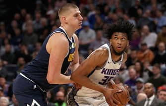 DENVER, COLORADO - FEBRUARY 13: Marvin Bagley III #35 of the Sacramento Kings drives to the basket against Nikola Jokic #15 of the Denver Nuggets in the second quarter at the Pepsi Center on February 13, 2019 in Denver, Colorado. NOTE TO USER: User expressly acknowledges and agrees that, by downloading and or using this photograph, User is consenting to the terms and conditions of the Getty Images License Agreement.  (Photo by Matthew Stockman/Getty Images)