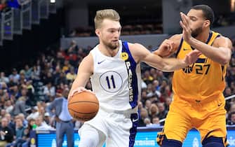 INDIANAPOLIS, INDIANA - NOVEMBER 27:   Domantas Sabonis #11 of the Indiana Pacers dribbles the ball against the Utah Jazz at Bankers Life Fieldhouse on November 27, 2019 in Indianapolis, Indiana.     NOTE TO USER: User expressly acknowledges and agrees that, by downloading and or using this photograph, User is consenting to the terms and conditions of the Getty Images License Agreement. (Photo by Andy Lyons/Getty Images)