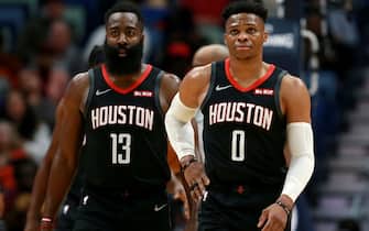 NEW ORLEANS, LOUISIANA - NOVEMBER 11: James Harden #13 of the Houston Rockets and Russell Westbrook #0 of the Houston Rockets stand on the court during a NBA game against the New Orleans Pelicans  at the Smoothie King Center on November 11, 2019 in New Orleans, Louisiana. NOTE TO USER: User expressly acknowledges and agrees that, by downloading and or using this photograph, User is consenting to the terms and conditions of the Getty Images License Agreement. (Photo by Sean Gardner/Getty Images)