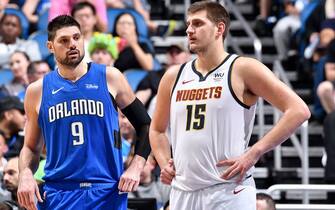 ORLANDO, FL - NOVEMBER 2: Nikola Vucevic #9 of the Orlando Magic standing with Nikola Jokic #15 of the Denver Nuggets during a game on November 2, 2019 at Amway Center in Orlando, Florida. NOTE TO USER: User expressly acknowledges and agrees that, by downloading and or using this photograph, User is consenting to the terms and conditions of the Getty Images License Agreement. Mandatory Copyright Notice: Copyright 2019 NBAE (Photo by Fernando Medina/NBAE via Getty Images)