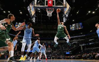 MEMPHIS, TN - DECEMBER 13: George Hill #3 of the Milwaukee Bucks shoots the ball against the Memphis Grizzlies on December 13, 2019 at FedExForum in Memphis, Tennessee. NOTE TO USER: User expressly acknowledges and agrees that, by downloading and or using this photograph, User is consenting to the terms and conditions of the Getty Images License Agreement. Mandatory Copyright Notice: Copyright 2019 NBAE (Photo by Joe Murphy/NBAE via Getty Images)
