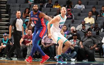 CHARLOTTE, NC - OCTOBER 16: Andre Drummond #0 of the Detroit Pistons and Cody Zeller #40 of the Charlotte Hornets fight for position during a pre-season game on October 16, 2019 at Spectrum Center in Charlotte, North Carolina. NOTE TO USER: User expressly acknowledges and agrees that, by downloading and/or using this Photograph, user is consenting to the terms and conditions of the Getty Images License Agreement. Mandatory Copyright Notice: Copyright 2019 NBAE (Photo by Kent Smith/NBAE via Getty Images)