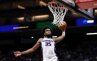 SACRAMENTO, CALIFORNIA - OCTOBER 16:  Marvin Bagley III #35 of the Sacramento Kings goes up for a dunk against the Melbourne United at Golden 1 Center on October 16, 2019 in Sacramento, California. NOTE TO USER: User expressly acknowledges and agrees that, by downloading and or using this photograph, User is consenting to the terms and conditions of the Getty Images License Agreement. (Photo by Ezra Shaw/Getty Images)