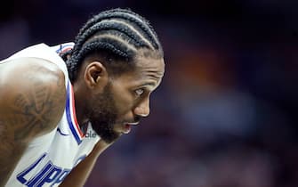 LOS ANGELES, CA - OCTOBER 10: Kawhi Leonard #2 of the LA Clippers looks on against the Denver Nuggets during a pre-season game on October 10, 2019 at STAPLES Center in Los Angeles, California. NOTE TO USER: User expressly acknowledges and agrees that, by downloading and/or using this Photograph, user is consenting to the terms and conditions of the Getty Images License Agreement. Mandatory Copyright Notice: Copyright 2019 NBAE (Photo by Chris Elise/NBAE via Getty Images)