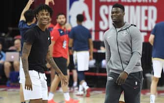 LAS VEGAS, NEVADA - JULY 14:  Ja Morant (L) of the Memphis Grizzlies and Zion Williamson #1 of the New Orleans Pelicans shoot during warmups before a semifinal game of the 2019 NBA Summer League at the Thomas & Mack Center on July 14, 2019 in Las Vegas, Nevada. NOTE TO USER: User expressly acknowledges and agrees that, by downloading and or using this photograph, User is consenting to the terms and conditions of the Getty Images License Agreement.  (Photo by Ethan Miller/Getty Images)