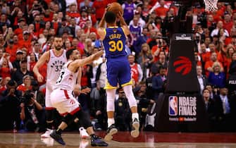 TORONTO, ONTARIO - JUNE 10:  Stephen Curry #30 of the Golden State Warriors attempts a shot against the Toronto Raptors in the second half during Game Five of the 2019 NBA Finals at Scotiabank Arena on June 10, 2019 in Toronto, Canada. NOTE TO USER: User expressly acknowledges and agrees that, by downloading and or using this photograph, User is consenting to the terms and conditions of the Getty Images License Agreement. (Photo by Gregory Shamus/Getty Images)