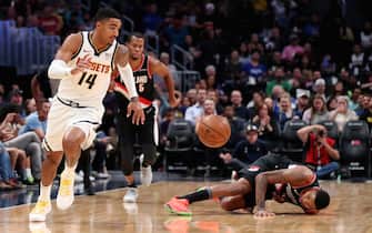 DENVER, COLORADO - OCTOBER 17: Gary Harris #14 of the Denver Nuggets drives past the defense of the Portland Trail Blazers in a preseason game at Pepsi Center on October 17, 2019 in Denver, Colorado. (Photo by Lizzy Barrett/Getty Images)