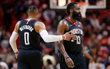 MIAMI, FLORIDA - OCTOBER 18:  Russell Westbrook #0 of the Houston Rockets celebrates with James Harden #13 against the Miami Heat during the first half at American Airlines Arena on October 18, 2019 in Miami, Florida. NOTE TO USER: User expressly acknowledges and agrees that, by downloading and or using this photograph, User is consenting to the terms and conditions of the Getty Images License Agreement. (Photo by Michael Reaves/Getty Images)