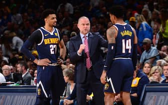 DENVER, CO - MAY 12: Michael Malone talks with Jamal Murray #27 and Gary Harris #14 of the Denver Nuggets during timeout against the Portland Trail Blazers during Game Seven of the Western Conference Semifinals of the 2019 NBA Playoffs on May 12, 2019 at the Pepsi Center in Denver, Colorado. NOTE TO USER: User expressly acknowledges and agrees that, by downloading and/or using this Photograph, user is consenting to the terms and conditions of the Getty Images License Agreement. Mandatory Copyright Notice: Copyright 2019 NBAE (Photo by Bart Young/NBAE via Getty Images)