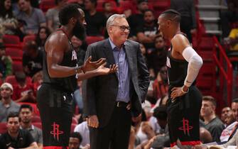 MIAMI, FL - OCTOBER 18: Head Coach Mike D'Antoni of the Houston Rockets, James Harden #13, and Russell Westbrook #0 of the Houston Rockets smile during a pre-season game against the Miami Heat on October 18, 2019 at American Airlines Arena in Miami, Florida. NOTE TO USER: User expressly acknowledges and agrees that, by downloading and or using this Photograph, user is consenting to the terms and conditions of the Getty Images License Agreement. Mandatory Copyright Notice: Copyright 2019 NBAE (Photo by Issac Baldizon/NBAE via Getty Images)