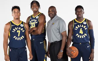 INDIANAPOLIS, IN - SEPTEMBER 27: Malcolm Brogdon #7, Myles Turner #33, Head Coach Nate McMillan and Victor Oladipo #4 of the Indiana Pacers pose for a portrait during media day on September 27, 2019 at Bankers Life Fieldhouse in Indianapolis, Indiana. NOTE TO USER: User expressly acknowledges and agrees that, by downloading and/or using this photograph, user is consenting to the terms and conditions of the Getty Images License Agreement. Mandatory Copyright Notice: Copyright 2019 NBAE (Photo by Ron Hoskins/NBAE via Getty Images)