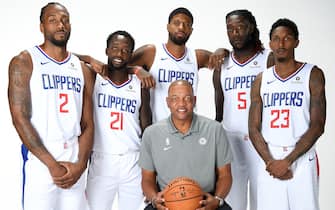 PLAYA VISTA, CA - SEPTEMBER 29: Kawhi Leonard #2, Patrick Beverley #21, Paul George #13, Head Coach Doc Rivers, Montrezl Harrell #5, and Lou Williams #23 of the LA Clippers pose for a portrait during media day on September 29, 2019 at the Honey Training Center: Home of the LA Clippers in Playa Vista, California. NOTE TO USER: User expressly acknowledges and agrees that, by downloading and/or using this photograph, user is consenting to the terms and conditions of the Getty Images License Agreement. Mandatory Copyright Notice: Copyright 2019 NBAE (Photo by Andrew D. Bernstein/NBAE via Getty Images)