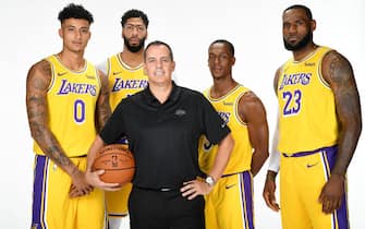 EL SEGUNDO, CA - SEPTEMBER 27: Kyle Kuzma #0, Anthony Davis #3, Head Coach Frank Vogel, Rajon Rondo #9, and LeBron James #23 of the Los Angeles Lakers pose for a portrait during media day on September 27, 2019 at the UCLA Health Training Center in El Segundo, California. NOTE TO USER: User expressly acknowledges and agrees that, by downloading and/or using this photograph, user is consenting to the terms and conditions of the Getty Images License Agreement. Mandatory Copyright Notice: Copyright 2019 NBAE (Photo by Andrew D. Bernstein/NBAE via Getty Images)