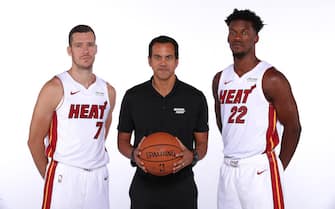 MIAMI, FL - September 30: Goran Dragic #7, Head Coach Erik Spoelstra, and Jimmy Butler #22 of the Miami Heat pose for a portrait during the 2019 Media Day at American Airlines Arena on September 30, 2019 in Miami, Florida. NOTE TO USER: User expressly acknowledges and agrees that, by downloading and/or using this photograph, user is consenting to the terms and conditions of the Getty Images License Agreement. Mandatory copyright notice: Copyright NBAE 2019 (Photo by Issac Baldizon/NBAE via Getty Images)