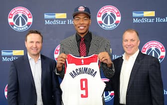 1151286332 WASHINGTON, DC - JUNE 21: Washington Wizards 2019 draft pick Rui Hachimura poses for a photo with Scott Brooks and Tommy Sheppard during a introductory press conference at Capital One Arena on June 21, 2019 in Washington, DC. NOTE TO USER: User expressly acknowledges and agrees that, by downloading and or using this photograph, User is consenting to the terms and conditions of the Getty Images License Agreement. (Photo by Ned Dishman/NBAE via Getty Images)