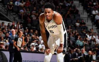 SAN ANTONIO, TX - OCTOBER 5: Dejounte Murray #5 of the San Antonio Spurs looks on during the game against the Orlando Magic during the preseason on October 5, 2019 at the AT&T Center in San Antonio, Texas. NOTE TO USER: User expressly acknowledges and agrees that, by downloading and or using this photograph, user is consenting to the terms and conditions of the Getty Images License Agreement. Mandatory Copyright Notice: Copyright 2019 NBAE (Photos by Logan Riely/NBAE via Getty Images)