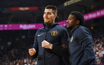 OAKLAND, CA - APRIL 2: Juan Hernangomez #41 of the Denver Nuggets and Malik Beasley #25 of the Denver Nuggets look on from the bench during the game against the Golden State Warriors on April 2, 2019 at ORACLE Arena in Oakland, California. NOTE TO USER: User expressly acknowledges and agrees that, by downloading and or using this photograph, user is consenting to the terms and conditions of Getty Images License Agreement. Mandatory Copyright Notice: Copyright 2019 NBAE (Photo by Garrett Ellwood/NBAE via Getty Images)