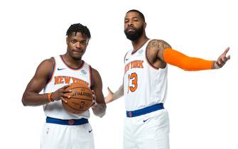 TARRYTOWN, NY - SEPTEMBER 30: Dennis Smith Jr. #5 and Marcus Morris #13 of the New York Knicks pose for a portrait during media day on September 30, 2019 at the Madison Square Garden Training Center in Tarrytown, New York. NOTE TO USER: User expressly acknowledges and agrees that, by downloading and/or using this photograph, user is consenting to the terms and conditions of the Getty Images License Agreement. Mandatory Copyright Notice: Copyright 2019 NBAE (Photo by Steven Freeman/NBAE via Getty Images)