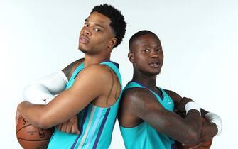 CHARLOTTE, NC - SEPTEMBER 30: Miles Bridges #0 of the Charlotte Hornets and Terry Rozier #3 of the Charlotte Hornets poses for a portrait during Media Day at Spectrum Center in Charlotte, North Carolina. NOTE TO USER: User expressly acknowledges and agrees that, by downloading and or using this photograph, User is consenting to the terms and conditions of the Getty Images License Agreement. Mandatory Copyright Notice: Copyright 2019 NBAE (Photo by Kent Smith/NBAE via Getty Images) 