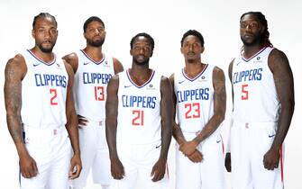 PLAYA VISTA, CA - SEPTEMBER 29: Kawhi Leonard #2, Paul George #13, Patrick Beverley #21, Lou Williams #23, and Montrezl Harrell #5 of the LA Clippers pose for a portrait during media day on September 29, 2019 at the Honey Training Center: Home of the LA Clippers in Playa Vista, California. NOTE TO USER: User expressly acknowledges and agrees that, by downloading and/or using this photograph, user is consenting to the terms and conditions of the Getty Images License Agreement. Mandatory Copyright Notice: Copyright 2019 NBAE (Photo by Andrew D. Bernstein/NBAE via Getty Images)
