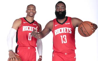 HOUSTON, TX - SEPTEMBER 27: Russell Westbrook #0 and James Harden #13 of the Houston Rockets pose for a portrait during media day on September 27, 2019 at The Post Oak Hotel in Houston, Texas. NOTE TO USER: User expressly acknowledges and agrees that, by downloading and/or using this photograph, user is consenting to the terms and conditions of the Getty Images License Agreement. Mandatory Copyright Notice: Copyright 2019 NBAE (Photo by Troy Fields/NBAE via Getty Images)