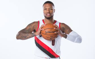 PORTLAND, OR - SEPTEMBER 30: Damian Lillard #0 of the Portland Trail Blazers poses for a portrait during Media Day September 30, 2019 at the Veterans Memorial Coliseum Portland, Oregon. NOTE TO USER: User expressly acknowledges and agrees that, by downloading and or using this photograph, user is consenting to the terms and conditions of the Getty Images License Agreement. Mandatory Copyright Notice: Copyright 2019 NBAE (Photo by Sam Forencich/NBAE via Getty Images)