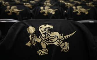 TORONTO, ON - OCTOBER 22:  Toronto Raptors Championship t-shirts on seats prior to an NBA game against the New Orleans Pelicans at Scotiabank Arena on October 22, 2019 in Toronto, Canada.  NOTE TO USER: User expressly acknowledges and agrees that, by downloading and or using this photograph, User is consenting to the terms and conditions of the Getty Images License Agreement.  (Photo by Vaughn Ridley/Getty Images)