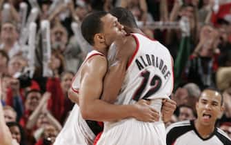 PORTLAND, OR - OCTOBER 31: Brandon Roy #7 and LaMarcus Aldridge #12 of the Portland Trail Blazers hug after their win over the San Antonio Spurs on October 31, 2008 at the Rose Garden Arena in Portland, Oregon. NOTE TO USER:  User expressly acknowledges and agrees that, by downloading and/or using this photograph, User is consenting to the terms and conditions of the Getty Images License Agreement. Mandatory Copyright Notice: Copyright 2008 NBAE  (Photo by Sam Forencich/NBAE via Getty Images)