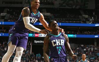 CHARLOTTE, NC - OCTOBER 23:  Miles Bridges #0 of the Charlotte Hornets celebrates with Dwayne Bacon #7 of the Charlotte Hornets during the game against the Chicago Bulls on October 23, 2019 at Spectrum Center in Charlotte, North Carolina. NOTE TO USER: User expressly acknowledges and agrees that, by downloading and or using this photograph, User is consenting to the terms and conditions of the Getty Images License Agreement.  Mandatory Copyright Notice:  Copyright 2019 NBAE (Photo by Brock Williams-Smith/NBAE via Getty Images)