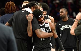 NEW YORK, NEW YORK - OCTOBER 23: DeAndre Jordan #6 hugs Kyrie Irving #11 of the Brooklyn Nets after their 127-126 loss to the Minnesota Timberwolves at Barclays Center on October 23, 2019 in the Brooklyn borough of New York City. NOTE TO USER: User expressly acknowledges and agrees that, by downloading and or using this photograph, User is consenting to the terms and conditions of the Getty Images License Agreement. (Photo by Emilee Chinn/Getty Images)