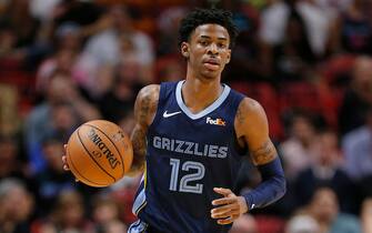 MIAMI, FLORIDA - OCTOBER 23:  Ja Morant #12 of the Memphis Grizzlies dribbles with the ball against the Miami Heat during the second half at American Airlines Arena on October 23, 2019 in Miami, Florida. NOTE TO USER: User expressly acknowledges and agrees that, by downloading and/or using this photograph, user is consenting to the terms and conditions of the Getty Images License Agreement. (Photo by Michael Reaves/Getty Images)