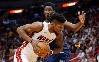 MIAMI, FLORIDA - OCTOBER 23:  Chris Silva #30 of the Miami Heat drives to the basket against Jaren Jackson Jr. #13 of the Memphis Grizzlies during the second half at American Airlines Arena on October 23, 2019 in Miami, Florida. NOTE TO USER: User expressly acknowledges and agrees that , by downloading and or using this photograph, User is consenting to the terms and conditions of the Getty Images License Agreement. (Photo by Michael Reaves/Getty Images)