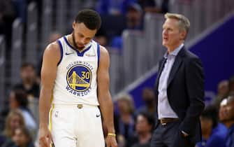 SAN FRANCISCO, CALIFORNIA - OCTOBER 24:   Stephen Curry #30 and head coach Steve Kerr of the Golden State Warriors react after a play during their game against the LA Clippers at Chase Center on October 24, 2019 in San Francisco, California.  NOTE TO USER: User expressly acknowledges and agrees that, by downloading and or using this photograph, User is consenting to the terms and conditions of the Getty Images License Agreement. (Photo by Ezra Shaw/Getty Images)