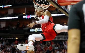 HOUSTON, TX - OCTOBER 24:  Russell Westbrook #0 of the Houston Rockets dunks the ball defended by Ersan Ilyasova #7 of the Milwaukee Bucks in the second half at Toyota Center on October 24, 2019 in Houston, Texas.  NOTE TO USER: User expressly acknowledges and agrees that, by downloading and or using this photograph, User is consenting to the terms and conditions of the Getty Images License Agreement.  (Photo by Tim Warner/Getty Images)