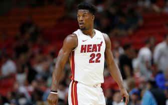 MIAMI, FLORIDA - OCTOBER 14:  Jimmy Butler #22 of the Miami Heat looks on against the Atlanta Hawks during the first half of the preseason game at American Airlines Arena on October 14, 2019 in Miami, Florida. NOTE TO USER: User expressly acknowledges and agrees that, by downloading and or using this photograph, User is consenting to the terms and conditions of the Getty Images License Agreement.  (Photo by Michael Reaves/Getty Images)