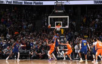 DENVER, CO - OCTOBER 25: Torrey Craig #3 of the Denver Nuggets blocks the potential game winning shot from Devin Booker #1 of the Phoenix Suns on October 25, 2019 at the Pepsi Center in Denver, Colorado. NOTE TO USER: User expressly acknowledges and agrees that, by downloading and/or using this Photograph, user is consenting to the terms and conditions of the Getty Images License Agreement. Mandatory Copyright Notice: Copyright 2019 NBAE (Photo by Garrett Ellwood/NBAE via Getty Images)
