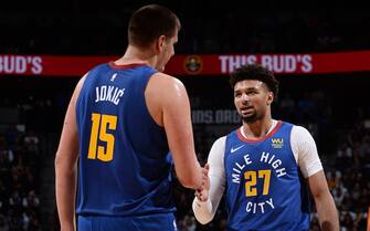 DENVER, CO - OCTOBER 25: Nikola Jokic #15 and Jamal Murray #27 of the Denver Nuggets hi-five during a game against the Phoenix Suns on October 25, 2019 at the Pepsi Center in Denver, Colorado. NOTE TO USER: User expressly acknowledges and agrees that, by downloading and/or using this Photograph, user is consenting to the terms and conditions of the Getty Images License Agreement. Mandatory Copyright Notice: Copyright 2019 NBAE (Photo by Bart Young/NBAE via Getty Images)
