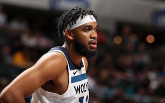 CHARLOTTE, NC - OCTOBER 25: Karl-Anthony Towns #32 of the Minnesota Timberwolves looks on against the Charlotte Hornets on October 25, 2019 at Spectrum Center in Charlotte, North Carolina. NOTE TO USER: User expressly acknowledges and agrees that, by downloading and or using this photograph, User is consenting to the terms and conditions of the Getty Images License Agreement.  Mandatory Copyright Notice: Copyright 2019 NBAE (Photo by Kent Smith/NBAE via Getty Images) 