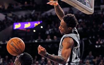 SAN ANTONIO,TX - OCTOBER 26: DeMar DeRozan #10 of the San Antonio Spurs scores against the Washington Wizards  at AT&T Center on October 26, 2019 in San Antonio, Texas.  NOTE TO USER: User expressly acknowledges and agrees that , by downloading and or using this photograph, User is consenting to the terms and conditions of the Getty Images License Agreement. (Photo by Ronald Cortes/Getty Images)