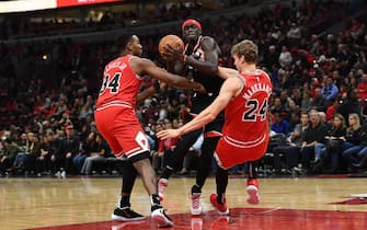 CHICAGO, ILLINOIS - OCTOBER 26:  Lauri Markkanen #24 of the Chicago Bulls is fouled by Pascal Siakam #43 of the Toronto Raptors during the first quarter at United Center on October 26, 2019 in Chicago, Illinois.  NOTE TO USER: User expressly acknowledges and agrees that, by downloading and or using this photograph, User is consenting to the terms and conditions of the Getty Images License Agreement. (Photo by Stacy Revere/Getty Images)