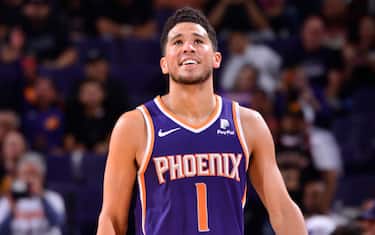 PHOENIX, AZ - OCTOBER 26: Devin Booker #1 of the Phoenix Suns smiles during a game against the LA Clippers on October 26, 2019 at Talking Stick Resort Arena in Phoenix, Arizona. NOTE TO USER: User expressly acknowledges and agrees that, by downloading and or using this photograph, user is consenting to the terms and conditions of the Getty Images License Agreement. Mandatory Copyright Notice: Copyright 2019 NBAE (Photo by Barry Gossage/NBAE via Getty Images)