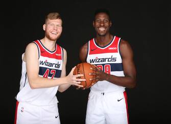 WASHINGTON, DC - SEPTEMEBER 30: Davis Bertans #42 and Ian Mahinmi #28 of the Washington Wizards poses for a portrait during the 2019 NBA Rookie Photo Shoot at the Washington Wizards Practice Facility on September 30, 2019 in Washington, D.C. NOTE TO USER: User expressly acknowledges and agrees that, by downloading and or using this photograph, User is consenting to the terms and conditions of the Getty Images License Agreement. Mandatory Copyright Notice: Copyright 2019 NBAE (Photo by Ned Dishman/NBAE via Getty Images)