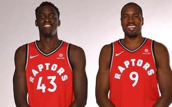 TORONTO, CANADA - SEPTEMBER 25:  Pascal Siakam #43, Serge Ibaka #9 and Jakob Poeltl #42 of the Toronto Raptors pose for a portrait during Media Day on September 25, 2017 at the BioSteel Centre in Toronto, Ontario, Canada. NOTE TO USER: User expressly acknowledges and agrees that, by downloading and or using this Photograph, user is consenting to the terms and conditions of the Getty Images License Agreement. Mandatory Copyright Notice: Copyright 2017 NBAE (Photo by Ron Turenne/NBAE via Getty Images)